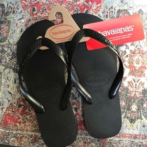 NWT Havaianas Black flip flops size 7/8W or 6/7M